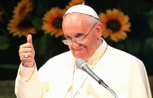 Pope Francis gives a thumbs up to Teilhard de Chardin